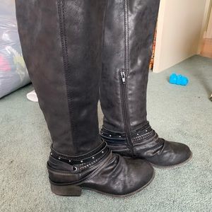Tall black boots